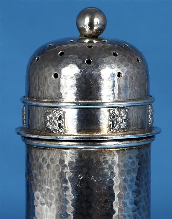 A George V Arts & Crafts silver sugar caster, by Albert Edward Jones, Height 168mm Weight: 5.7oz/180grms